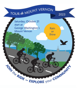 Tour de Mount Vernon logo showing illustrative silhouettes of cyclists on a road with trees, the Mount Vernon estate, the sun, sky, and a bird in the background.